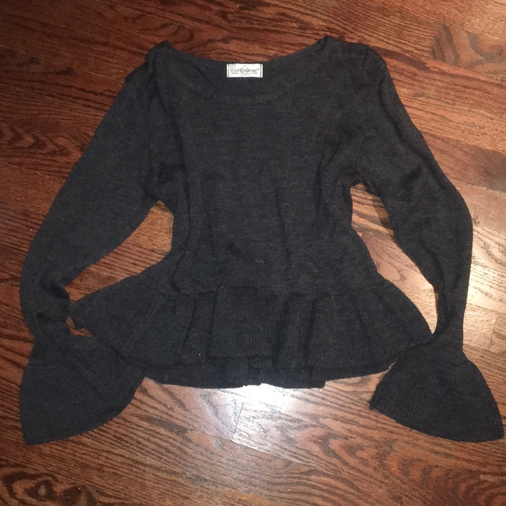 Ruffle bottom and sleeve sweater